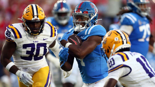 Ole Miss running back Quinshon Judkins runs the ball during a game against visiting LSU on Sept. 30, 2023.